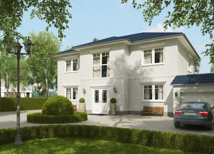 Das Bild zeigt eine moderne Stadtvilla mit Garage. Wenn Sie auch eine Stadtvilla in Berlin und Brandenburg bauen lassen möchten, hilft Ihnen Baufirma Wilms AG gern weiter.